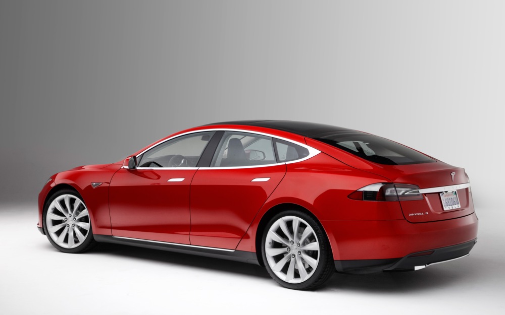 2013 Tesla model s red street rear view